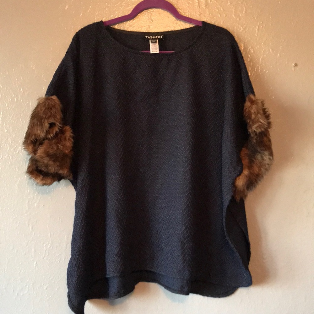 Navy blue poncho with fur sleeves
